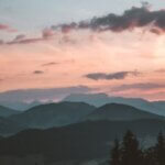 peaceful mountain with clouds affirmations for peace safety